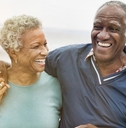 happy senior african american couple on the beach