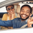 Smiling couple in a car
