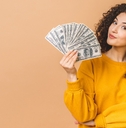 young woman holding money banknotes 