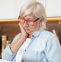woman financially stressed and pressured by mortgage debt