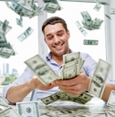 happy businessman with heap of money