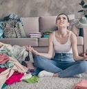 annoyed woman discover many dirty dressing clothes