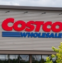 costco wholesale sign board outside store during day time