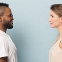 man and woman looking at each other