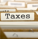 taxes concept with word on folder