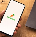 Instacart logo on phone screen