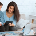 couple preparing for vacation and calculating expenses