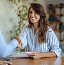 happy woman getting hired for the job
