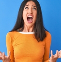 woman wearing orange t-shirt shouting