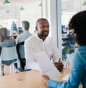  job applicant answering questions during an office interview