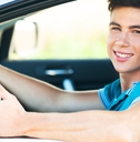 Teen driving a car