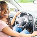 Young girl driving