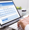 A man is answering an online survey
