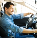 Young man driving a car