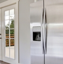 kitchen room with steel appliances