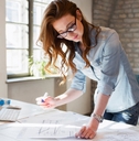 young female architect working on project