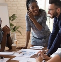 multi ethnic team working in office