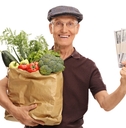 elderly man groceries and money