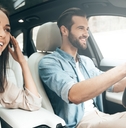 Couple riding in a car
