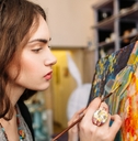 painter paints in her studio