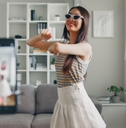 Woman dancing for a video