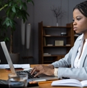 businesswoman types response to customer