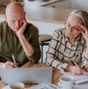 senior couple stressing about budget