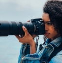 Woman taking a photograph