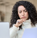 female accounting analyst checking bills