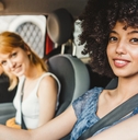 Smiling women in a car