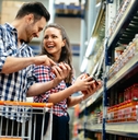 couple shopping at supermarket