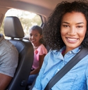 Happy family in car