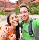 travel hiking selfie by happy couple on hike
