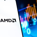 amd logo on smartphone with colorful codes at the back