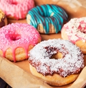 fresh homemade donuts with various toppings