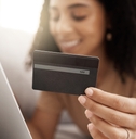 woman customer using her laptop in the living room