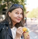 woman eating multi-flavoured icecream.