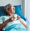 hospitalized patient looking out of window