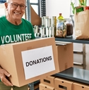 senior man wearing volunteer uniform