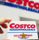 hand holding costco gold membership card