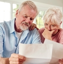 senior  couple reviewing bills