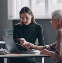 confident financial advisor discussing options