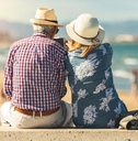 senior couple enjoying time on beach
