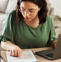woman with laptop in home office