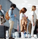 multi ethnic people waiting at airport