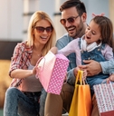 Couple with doughter after shopping
