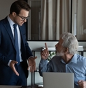 male colleague arguing with senior boss