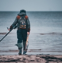 metal detector on sandy beach