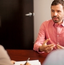 Young man being interviewed for a job position.