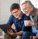 adult son using tablet smartphone